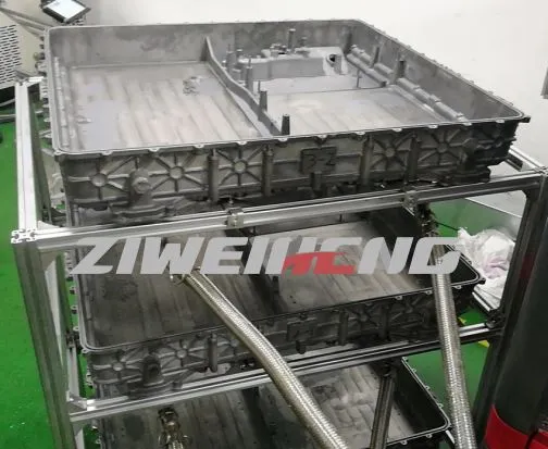 Korpus valatud alumiiniumist osade jaoks, millel on integreeritud jahutusvede...